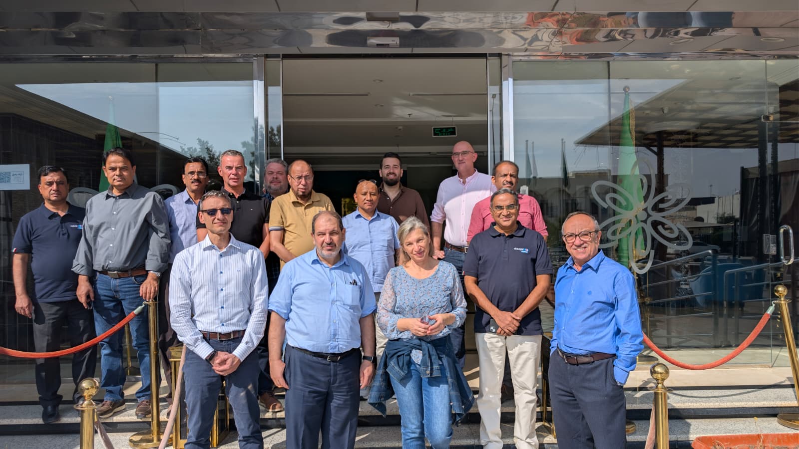 Technofrigo team in Riyadh — wider group photo on the steps